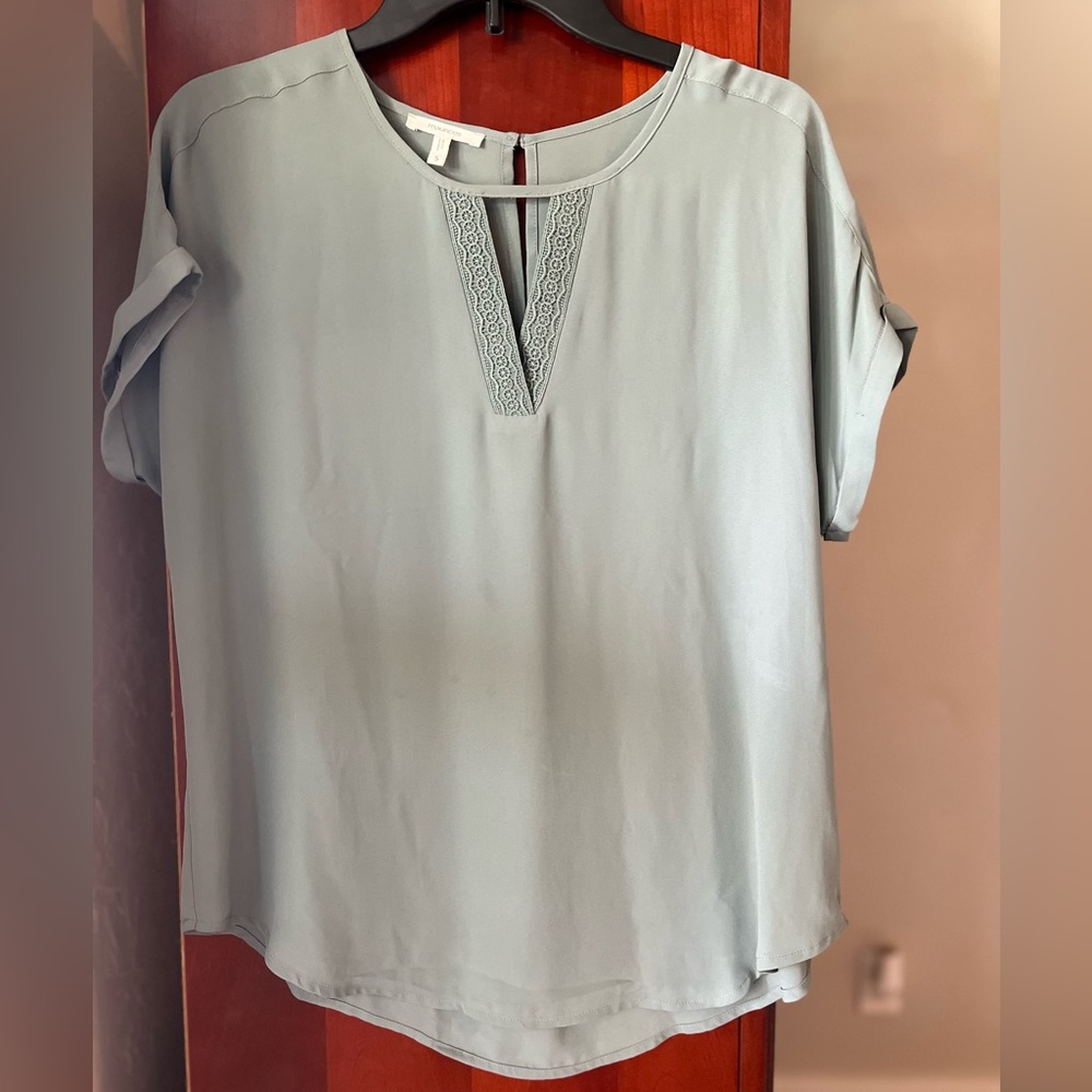 Beautiful olive green short sleeve shirt with v neck lace detail